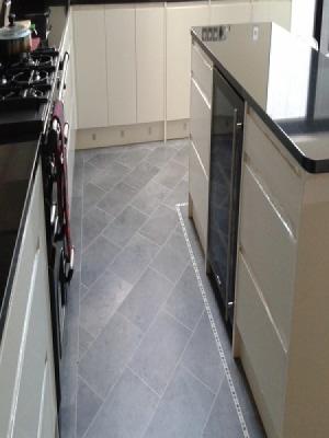 karndean professonialy installed to qualify for the warranty. using approved fitters. cumbrian stone knight tile 